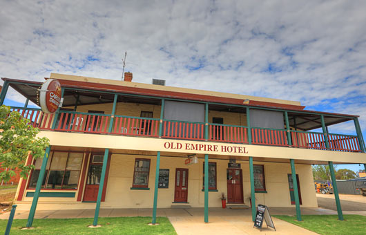 Close up of double story building - Old Empire Hotel